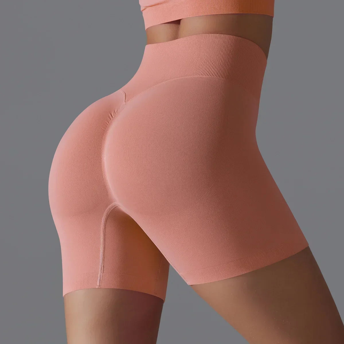 Seamless Solid Color Yoga Shorts, Tight Fitting Running and Fitness Yoga Clothes, High Waist and Hip Lifting Peach Sports Pants