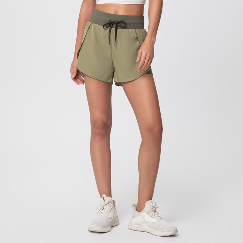 High-waisted shorts with pockets - seamless sports shorts with drawstring tie