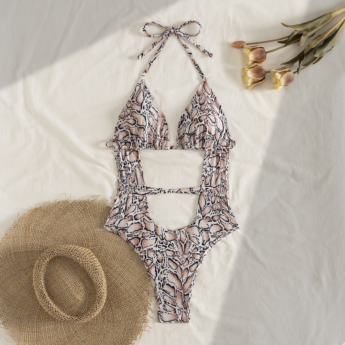 Cut-out one-piece swimsuit with snake print & tie strings