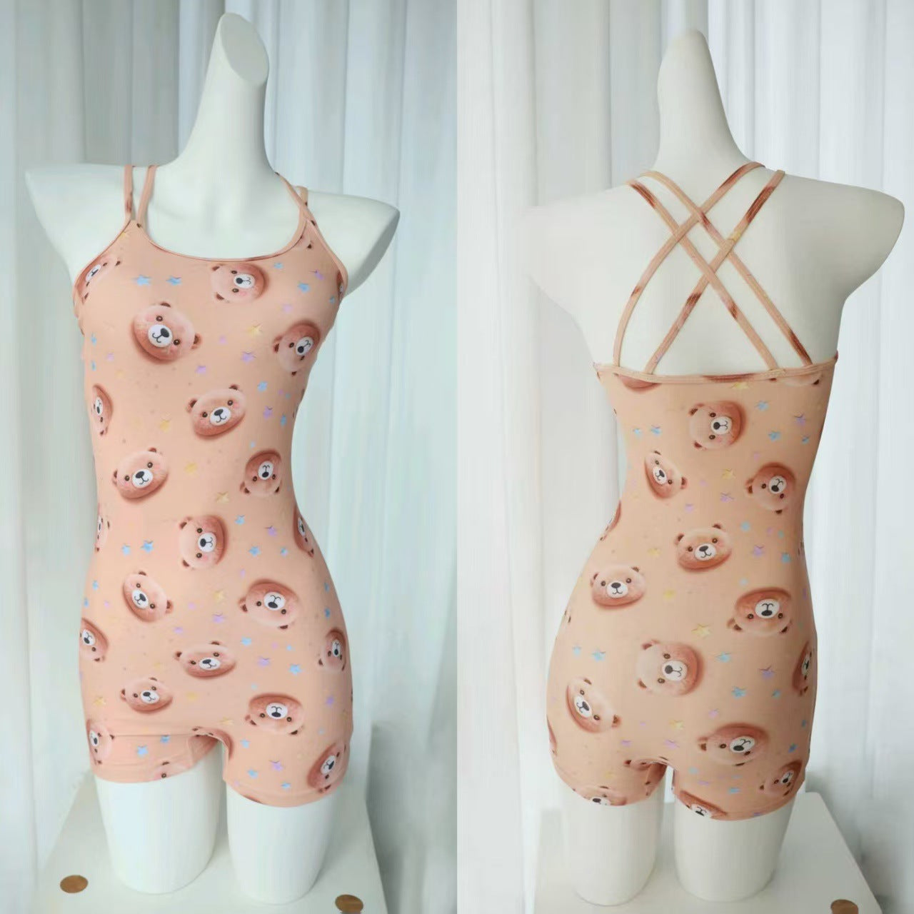 high-waisted one-piece swimsuit with crisscross straps