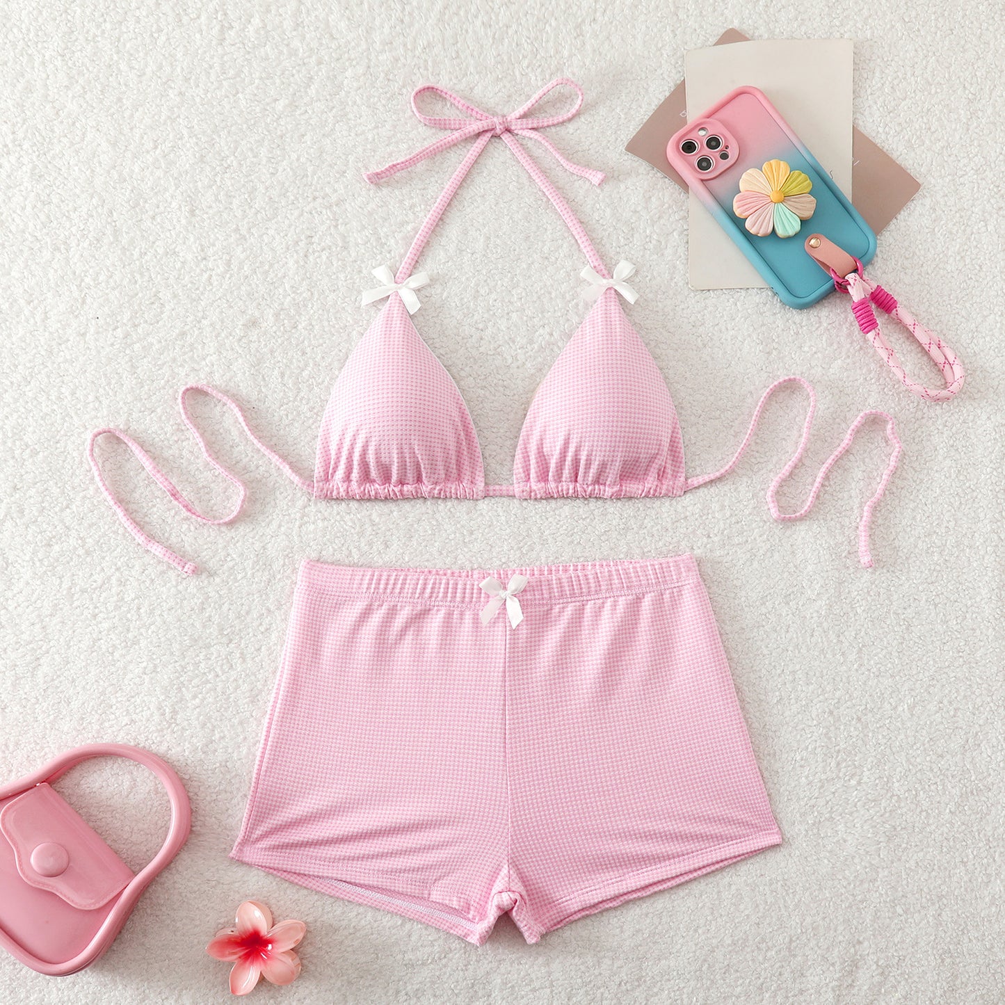 Bikini set with bow ties, striped high-waist shorts and contrast trim