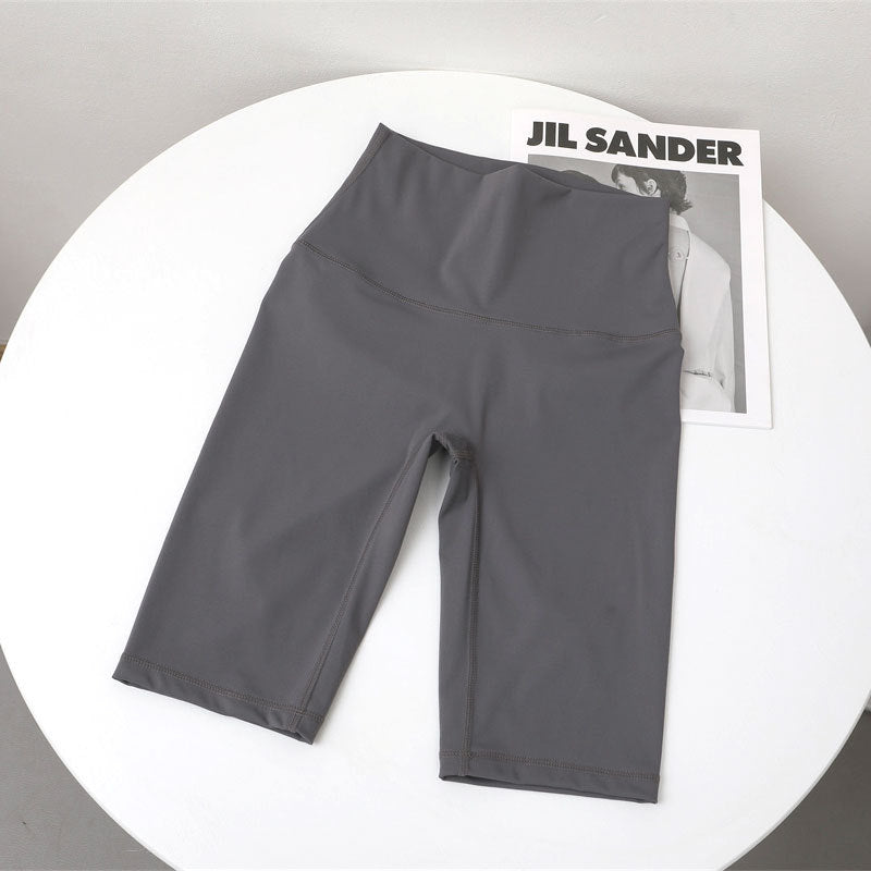 High-waisted five-quarter yoga shorts: sculpting comfort for summer athleisure