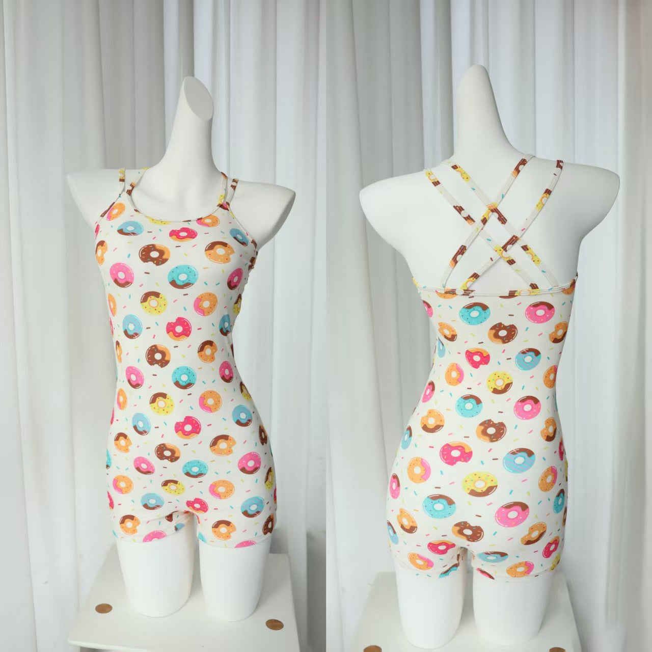 high-waisted one-piece swimsuit with crisscross straps