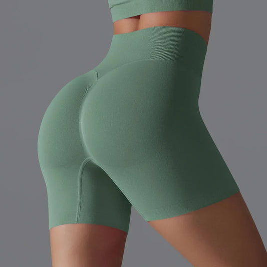 Seamless Solid Color Yoga Shorts, Tight Fitting Running and Fitness Yoga Clothes, High Waist and Hip Lifting Peach Sports Pants