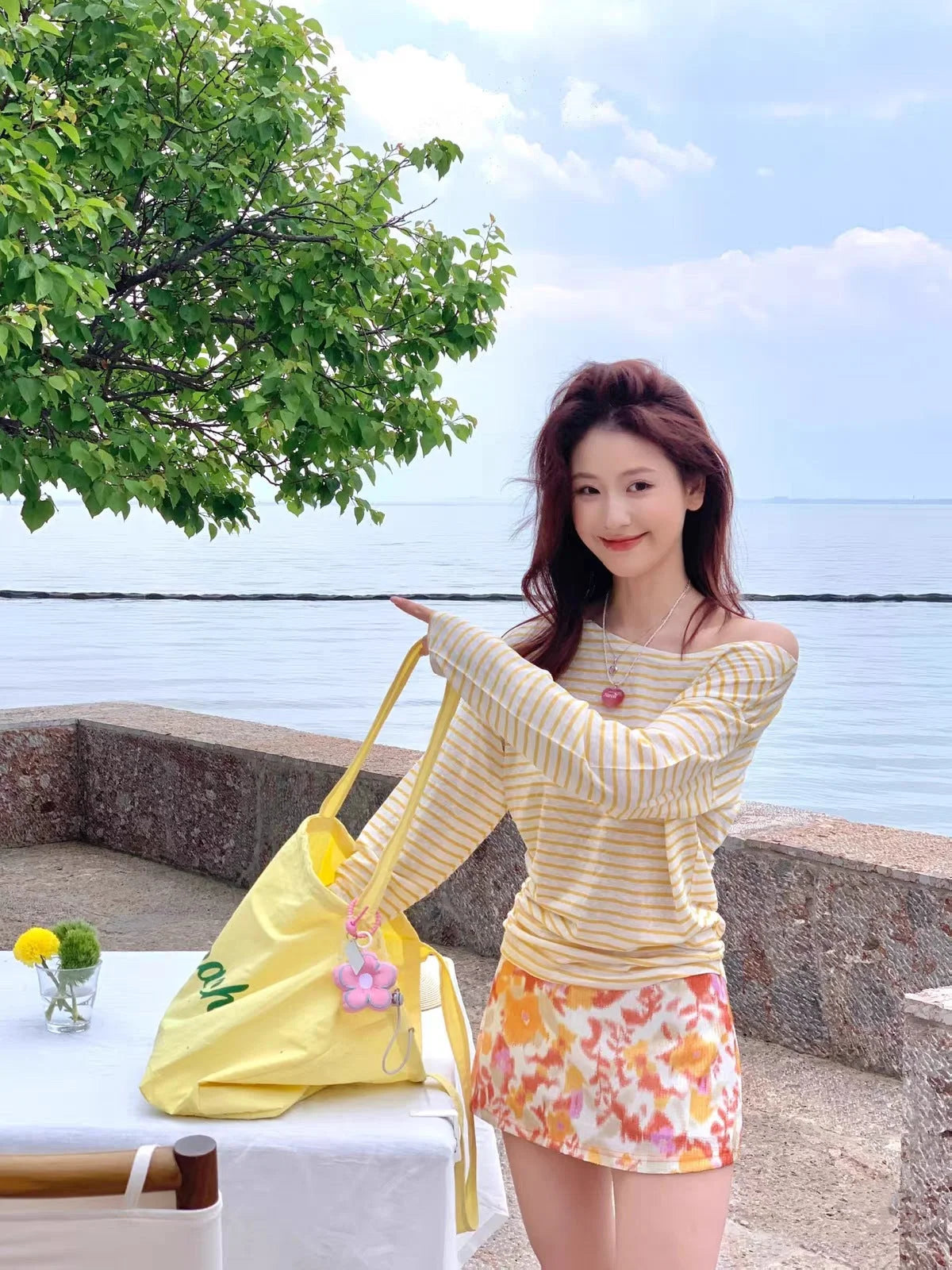 Multi-piece bikini set with long sleeve cover-up skirt for summer beach holiday