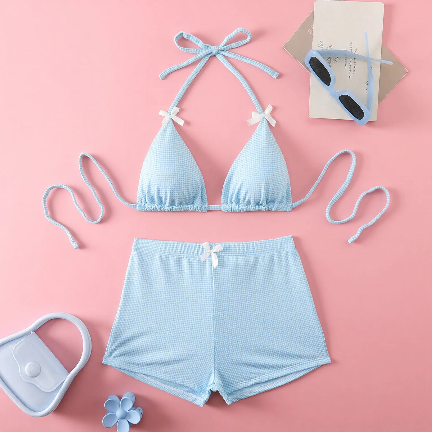 Bikini set with bow ties, striped high-waist shorts and contrast trim