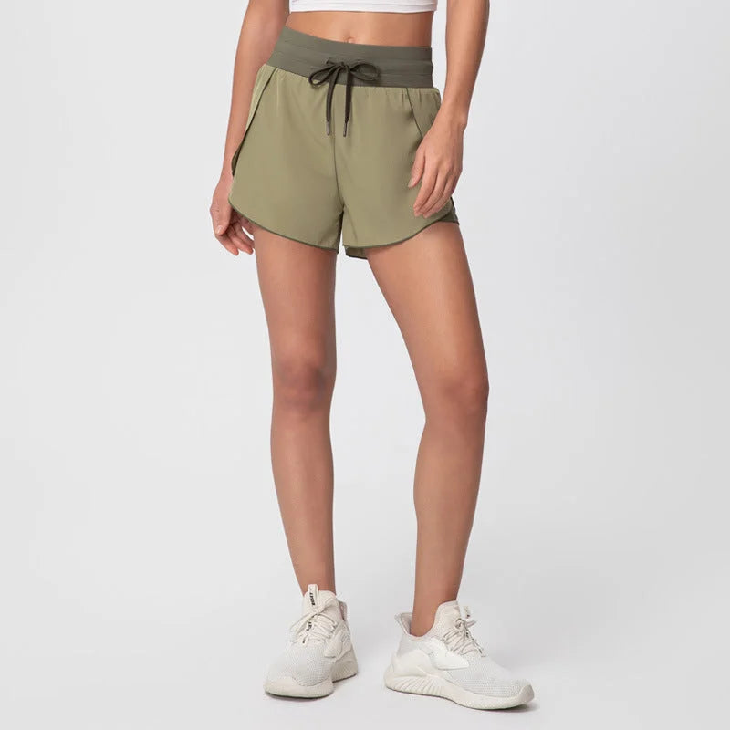 High-waisted shorts with pockets - seamless sports shorts with drawstring tie