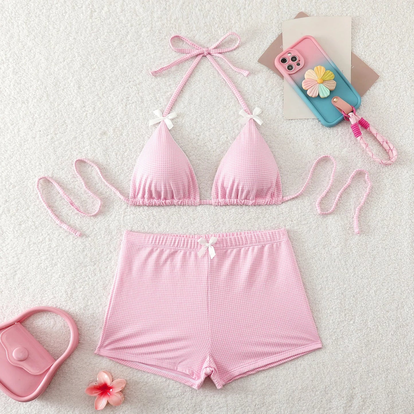 Bikini set with bow ties, striped high-waist shorts and contrast trim