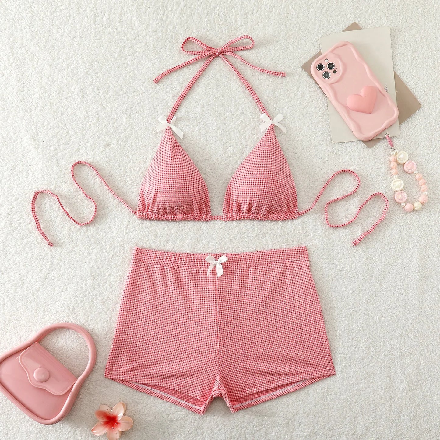 Bikini set with bow ties, striped high-waist shorts and contrast trim